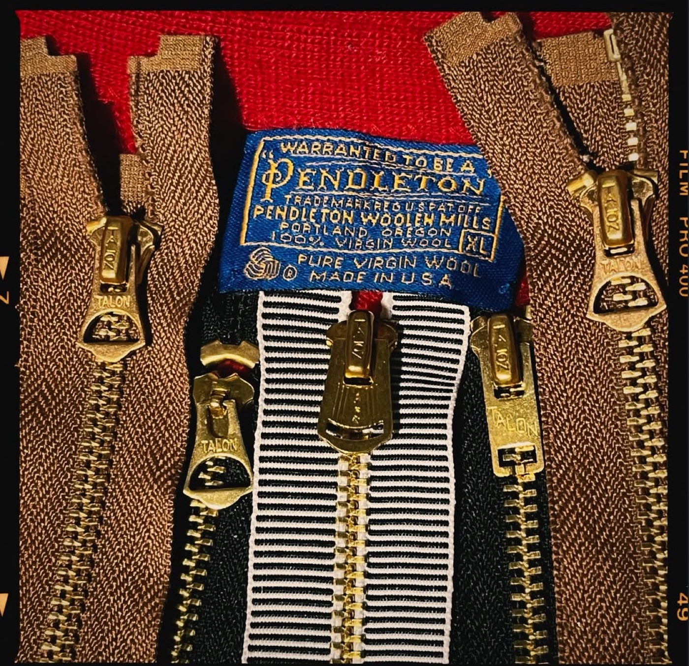 A collection of vintage Talon zipper hardware, an American zipper maker used on workwear, denim, military and outdoor clothing from the 1930s to the 1960s and prized today for dating vintage garments